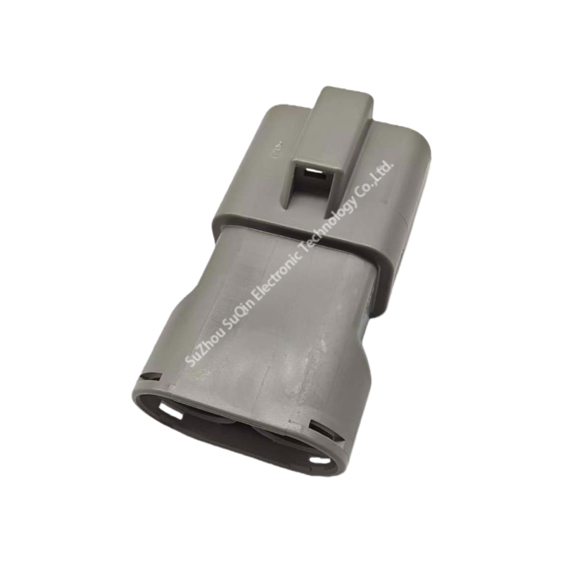 Front view of Yazaki 58 series 2-pole male connector housing showing grey PBT body and 9.5mm tab openings.